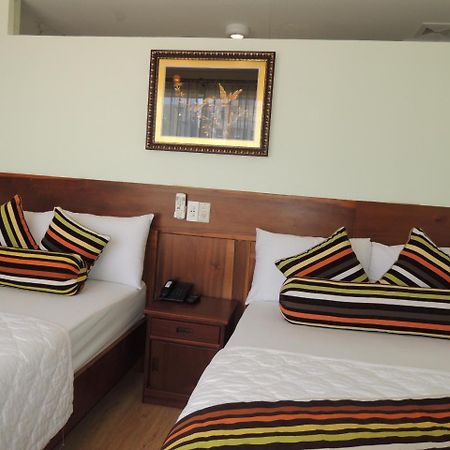 Art Deluxe Hotel Nha Trang Quarto foto