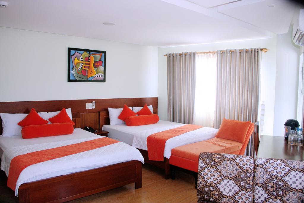 Art Deluxe Hotel Nha Trang Quarto foto