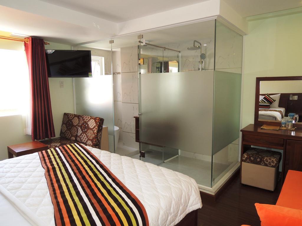 Art Deluxe Hotel Nha Trang Quarto foto