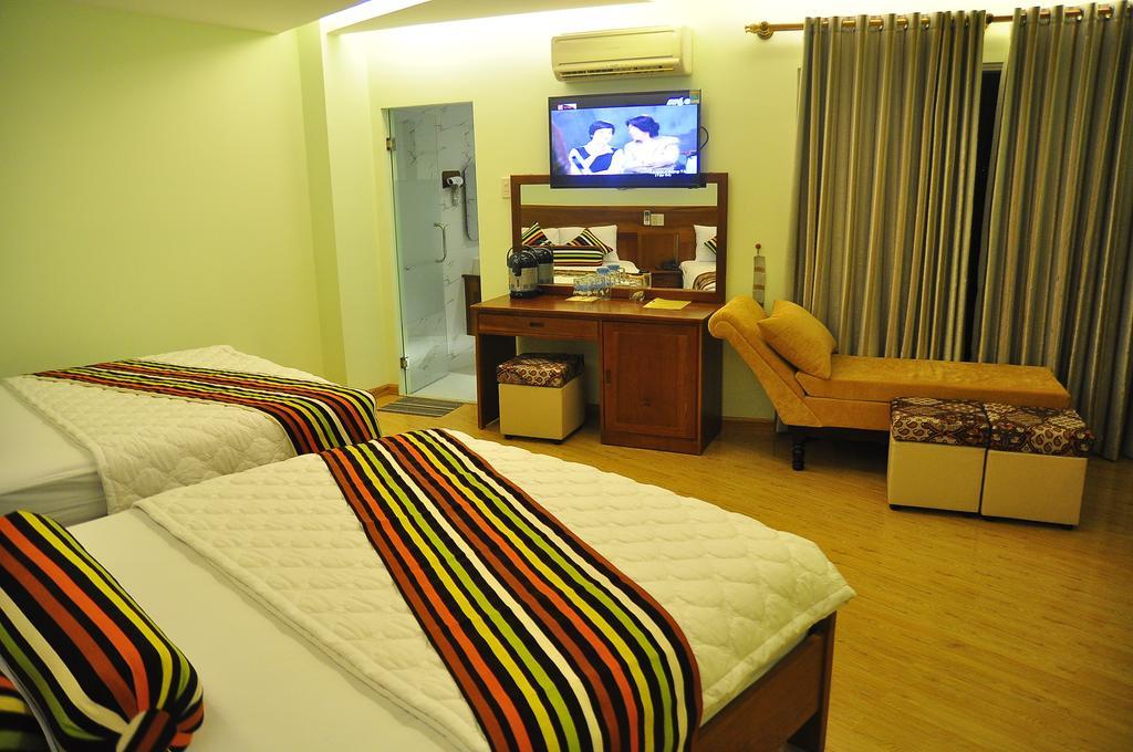 Art Deluxe Hotel Nha Trang Quarto foto