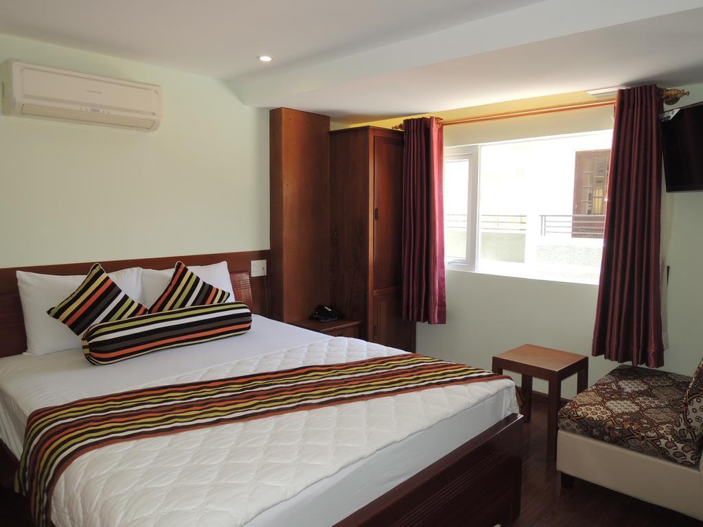 Art Deluxe Hotel Nha Trang Quarto foto